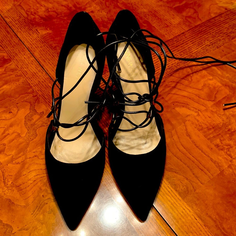 Black suede pumps with leather ankle tie straps. Heel is 3 1/2 inches.